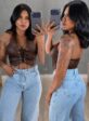calça jeans flare bordada