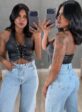 calça jeans flare bordada